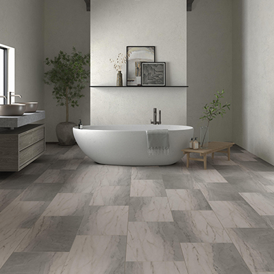 bathroom with grey tile flooring